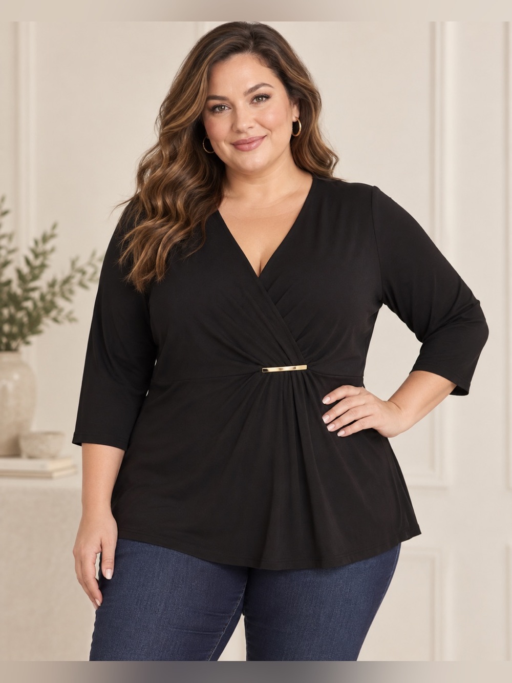 Black Michael Kors blouse with a V-neck, faux-wrap design, and gold bar at the w